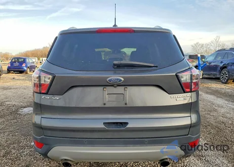 2017 Ford Escape Titanium z USA, uszkodzony, nr VIN 1FMCU9JDXHUE33011